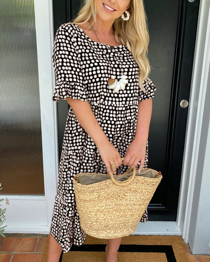 Élodie – Robe midi élégante à col rond avec un imprimé à pois charmant