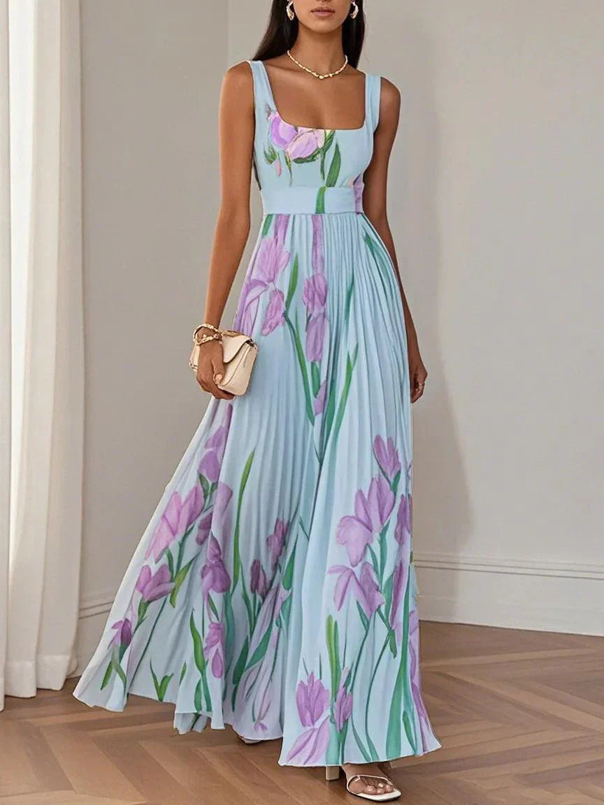 Clara – Robe longue élégante à volants avec un joli motif floral