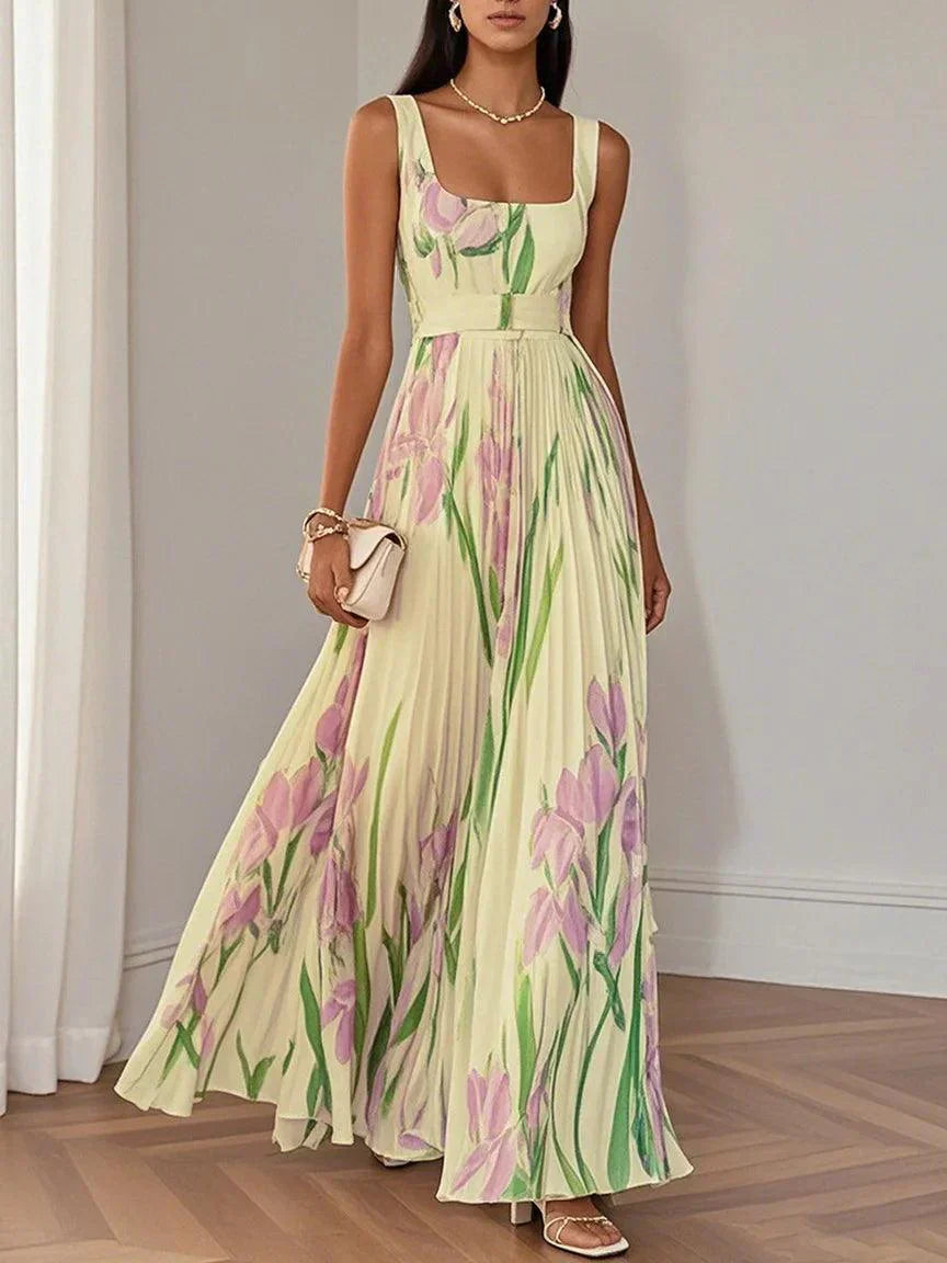 Clara – Robe longue élégante à volants avec un joli motif floral