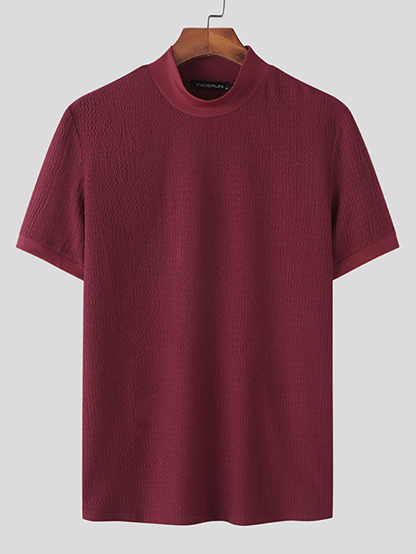 Conrad – Pull élégant à col roulé et manches courtes, alliant confort moderne et style tendance