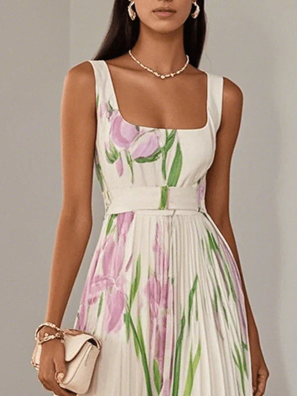 Clara – Robe longue élégante à volants avec un joli motif floral